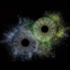 Mystical "Iris Art online" piece "Hidden Galaxy": two human eye irises (blue and brown) surrounded by a powerful blue and yellowish dust cloud effect on a black background. This meaningful piece is part of the iris art online collection, symbolizing hidden soul harmony. Order your online iris scan now.