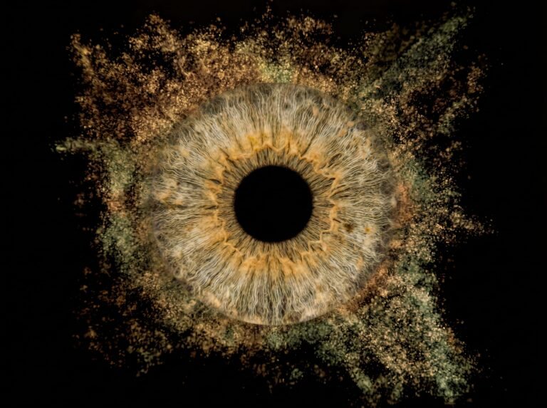 Golden Bloom custom single iris art featuring one real hazel and gold eye iris surrounded by elegant golden burst textures on a black background.