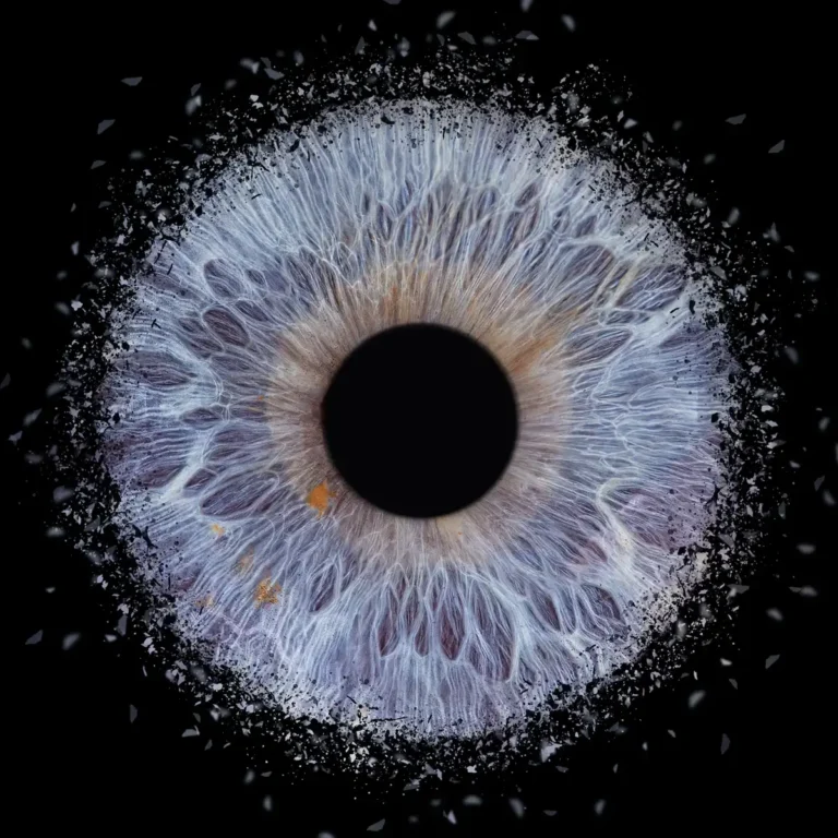 Soft Eclipse custom single eye art featuring one real iris in soft blue and lavender tones with delicate glowing details on a black background.