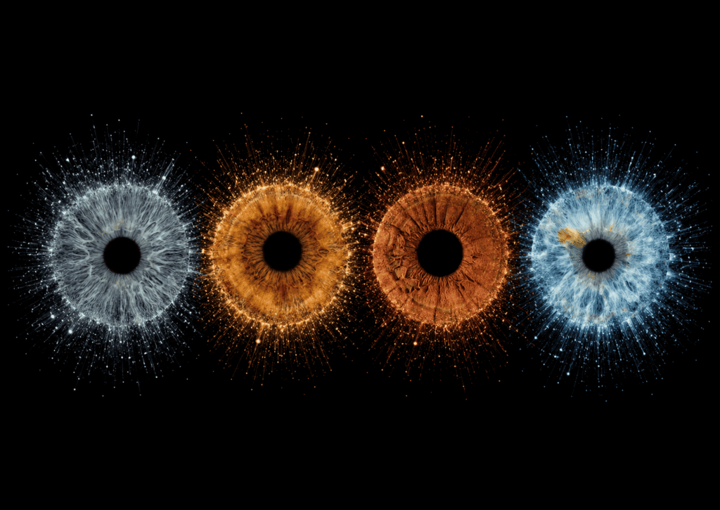 Stardust Kinship custom four iris photography artwork featuring four family eyes glowing through blue and golden stardust on black.