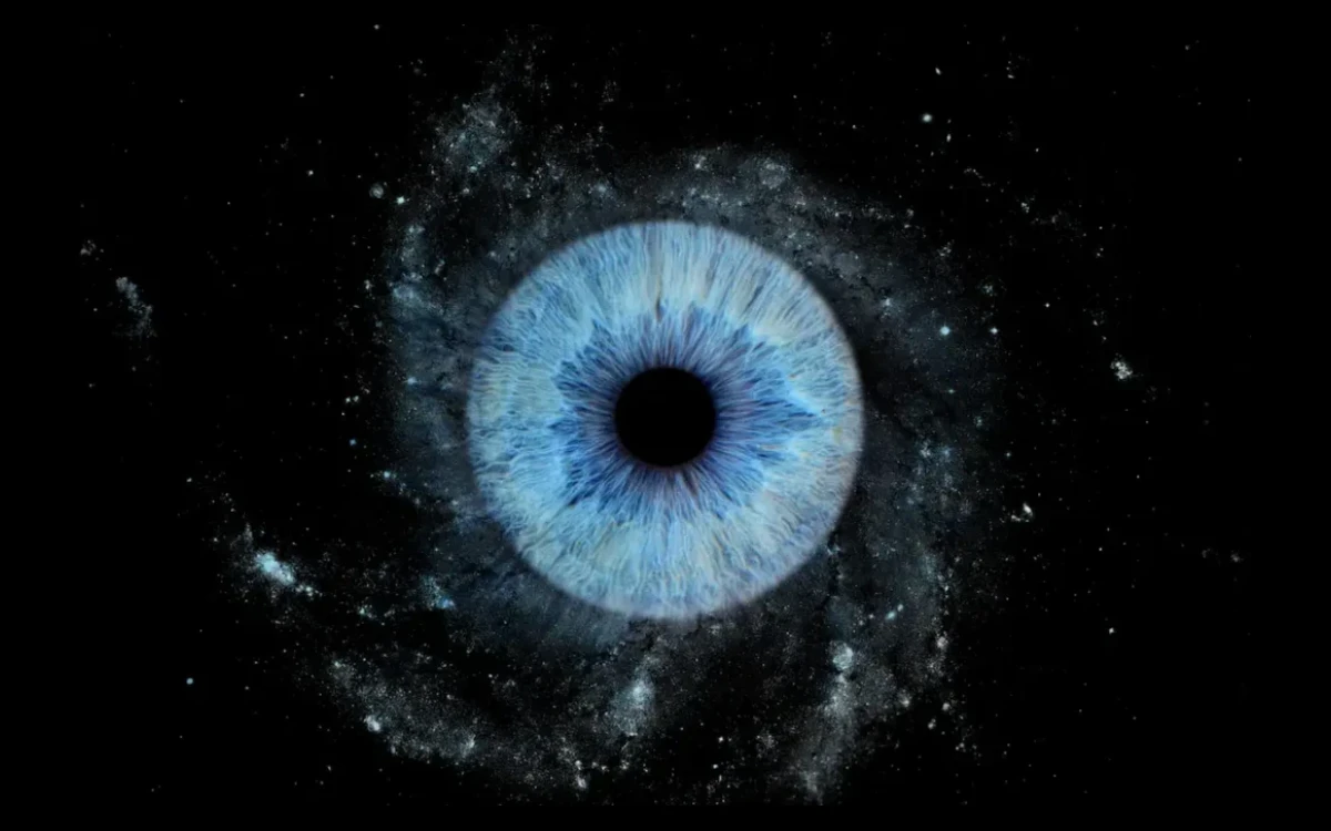 Blue Nebula personalized single eye photography art featuring one real blue iris surrounded by a deep cosmic nebula effect on black.